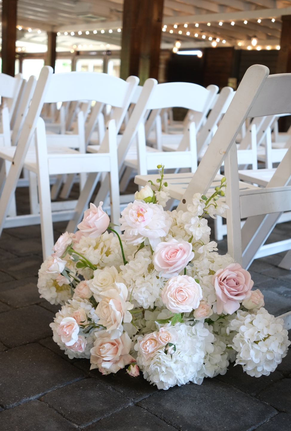 Pearl Blush Aisle Flowers
